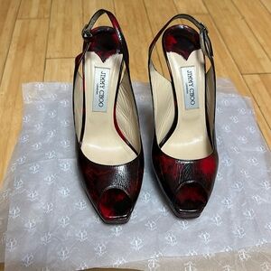 Jimmy Choo red and black pump.